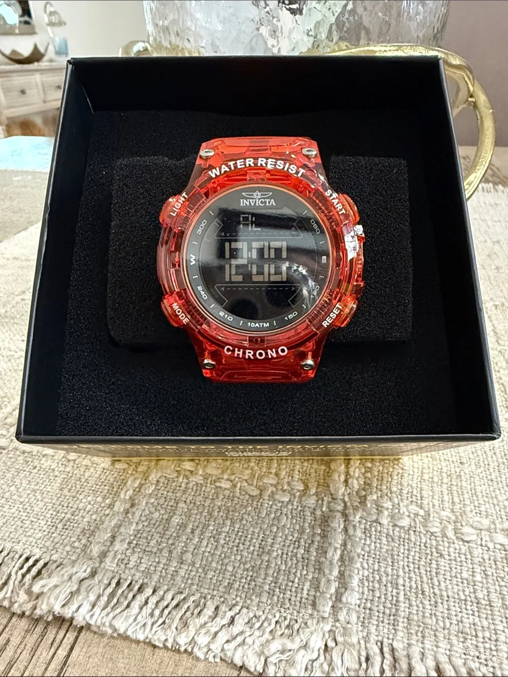Invicta translucent orange digital chronograph watch
